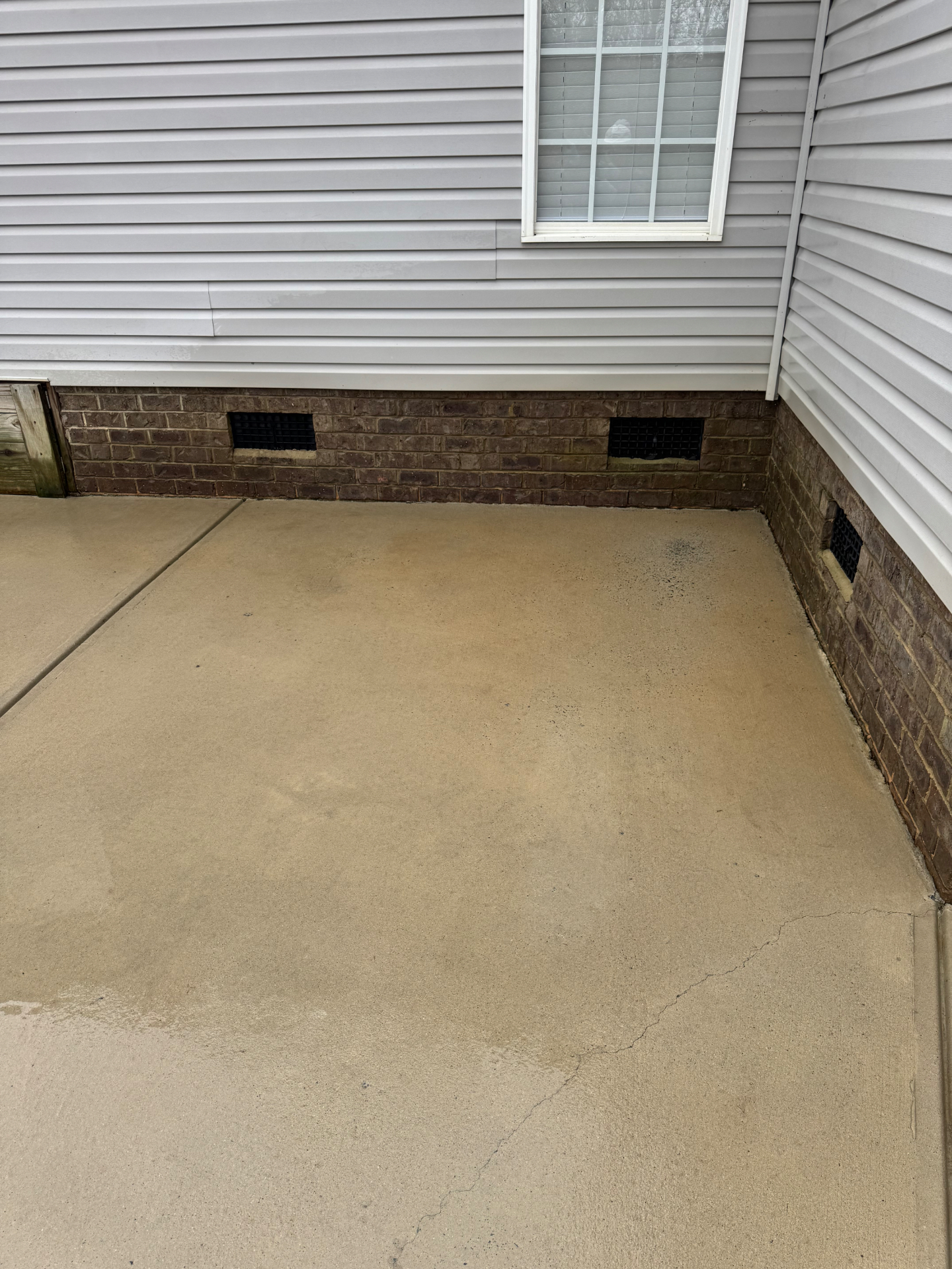 Concrete patio after pressure washing